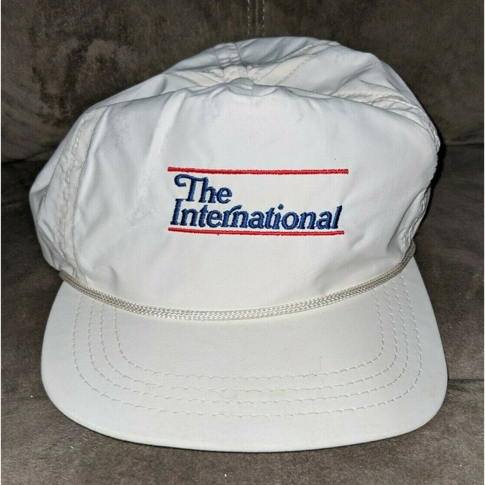The International White & Blue Strapback hat cap Vintage Adjustable RARE HTF EUC